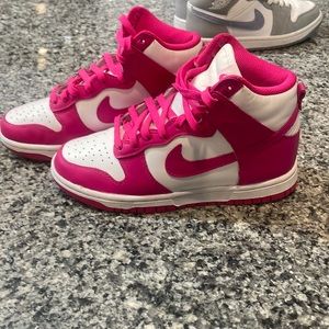 Hot pink and white mid Nikes